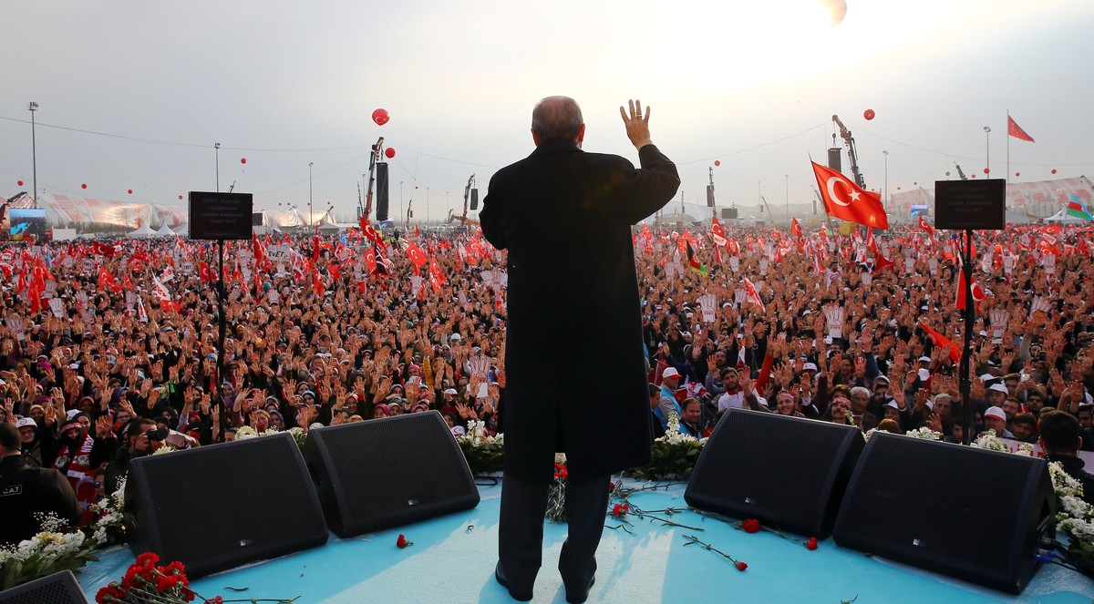 epa05897558 A handout photo made available by Turkish President Press office shows, Turkish President Recep Tayyip Erdogan speaks during a 'Vote Yes' rally in Istanbul, Turkey, 08 April 2017 ...