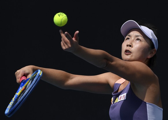 FILE - China&#039;s Peng Shuai serves to Japan&#039;s Nao Hibino during their first round singles match at the Australian Open tennis championship in Melbourne, Australia, on Jan. 21, 2020. The wherea ...