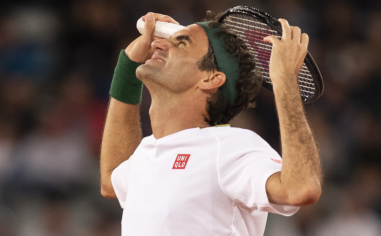 epa08201043 Roger Federer of Switzerland reacts whilst playing Rafael Nadal from Spain (not pictured) during the Match in Africa Cape Town charity event, Cape Town, South Africa 07 February 2020. Pres ...