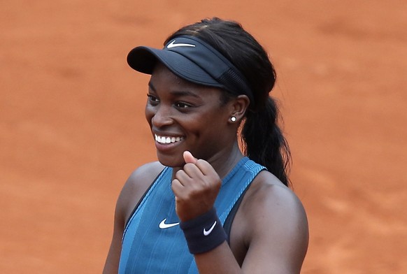 Sloane Stephens of the U.S. clenches her fist as she defeats Russia&#039;s Daria Kasatkina during their quarterfinal match of the French Open tennis tournament at the Roland Garros stadium, Tuesday, J ...