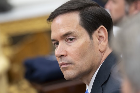 epa12158291 US Secretary of State Marco Rubio listens during a meeting between the US president and the German chancellor at the Oval Office of the White House in Washington, DC, USA, 05 June 2025. EP ...