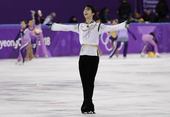 Yuzuru Hanyu of Japan reacts after his performance in the men&#039;s free figure skating final in the Gangneung Ice Arena at the 2018 Winter Olympics in Gangneung, South Korea, Saturday, Feb. 17, 2018 ...