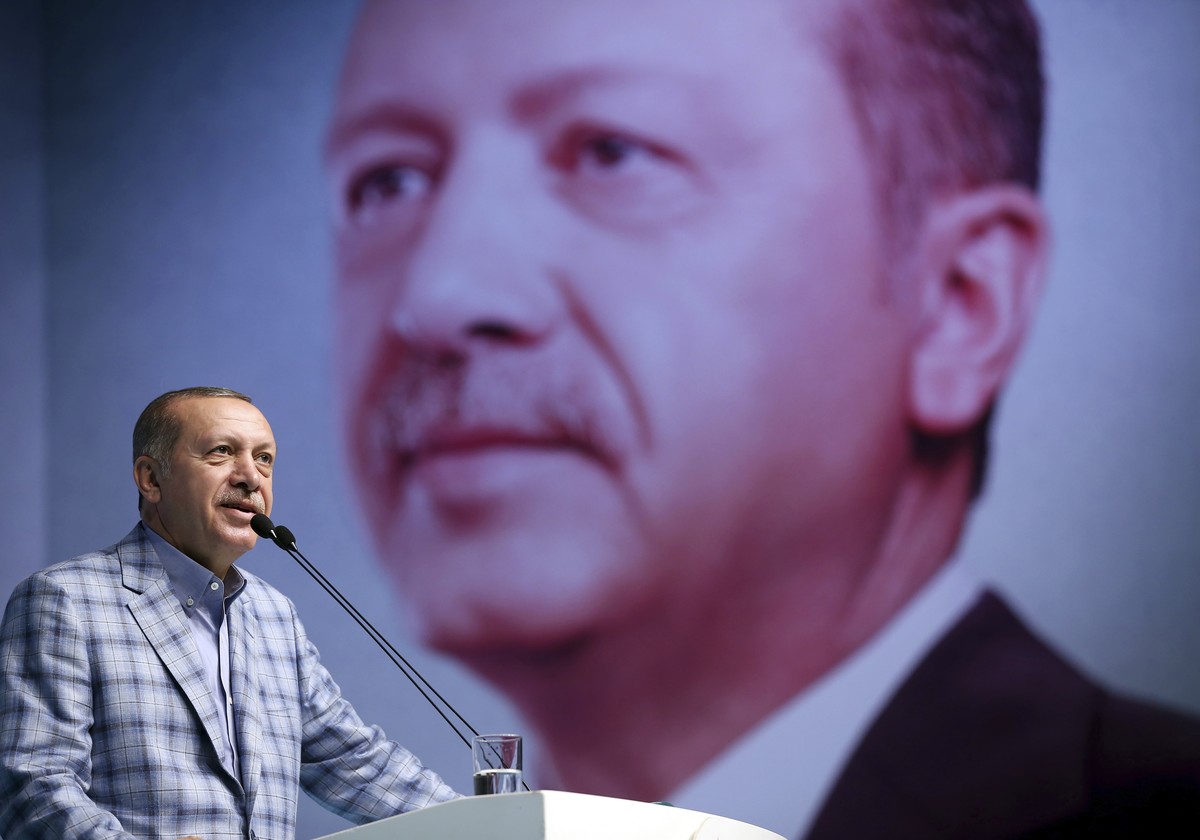 Turkey's President and leader of ruling Justice and Development Party Recep Tayyip Erdogan addresses his party members in Istanbul, Sunday, June 25, 2017. Erdogan on Sunday rejected a demand by m ...