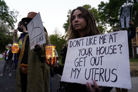 epa09937018 Pro-abortion protesters gather for a vigil outside the home of Supreme Court Judge Samuel Alito in Alexandria, Virginia, USA, 09 May 2022. According to leaked documents, the Supreme Court  ...