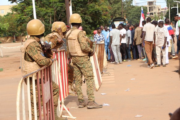 epa10216248 Burkina Faso military close a street in Ouagadougou, Burkina Faso, 30 September 2022. Gunshots have been heard near the presidential palace in Ouagadougou with what some residents claim to ...