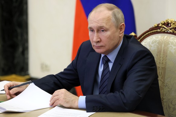 Russian President Vladimir Putin attends via video conference the opening of social facilities in various regions that were built or overhauled as part of federal and regional development programmes,  ...