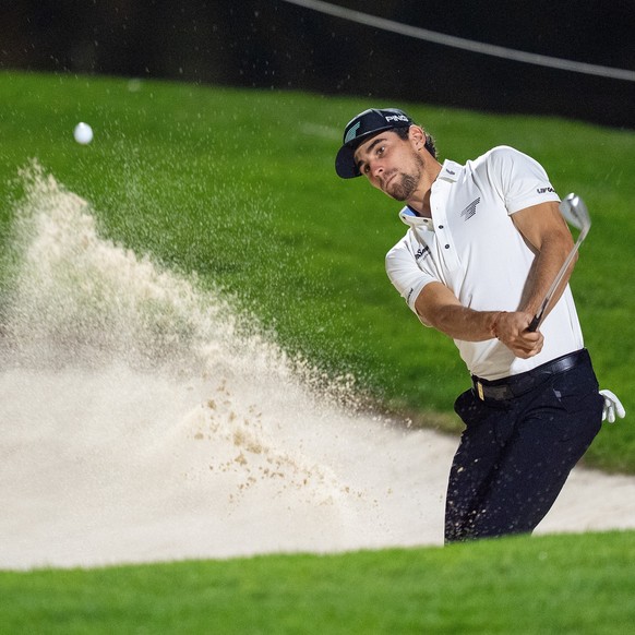 Captain JoaquÌn Niemann of Torque GC hits his shot from a bunker on the 13th hole during the final round of the LIV Golf tournament at Riyadh Golf Club, Saturday, Feb. 7, 2026 in Riyadh, Saudi Arabia. ...