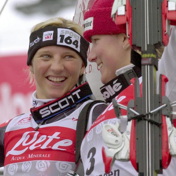 BGL20 - 20020120 - BERCHTESGADEN, GERMANY : US American Kristina Koznick (R) and Swiss Marlies Oester cheer on the podium of the women&#039;s World Cup slalom in Berchtesgaden on Sunday, 20 January 20 ...