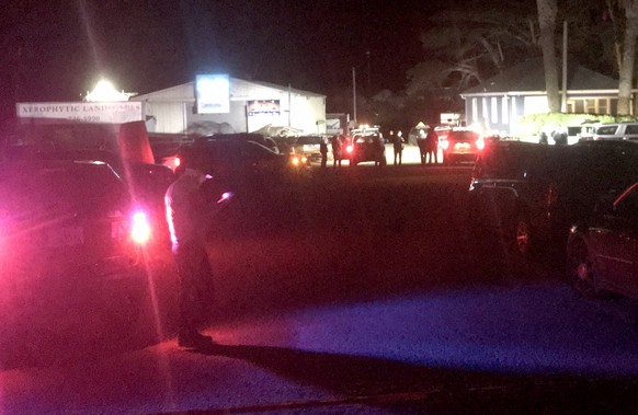 epa10425835 Half Moon Bay police vehicles surround one of two scenes of mass shootings at farms in Half Moon Bay, California, U.S., January 23, 2023. The suspected gunman who turned himself in to police...