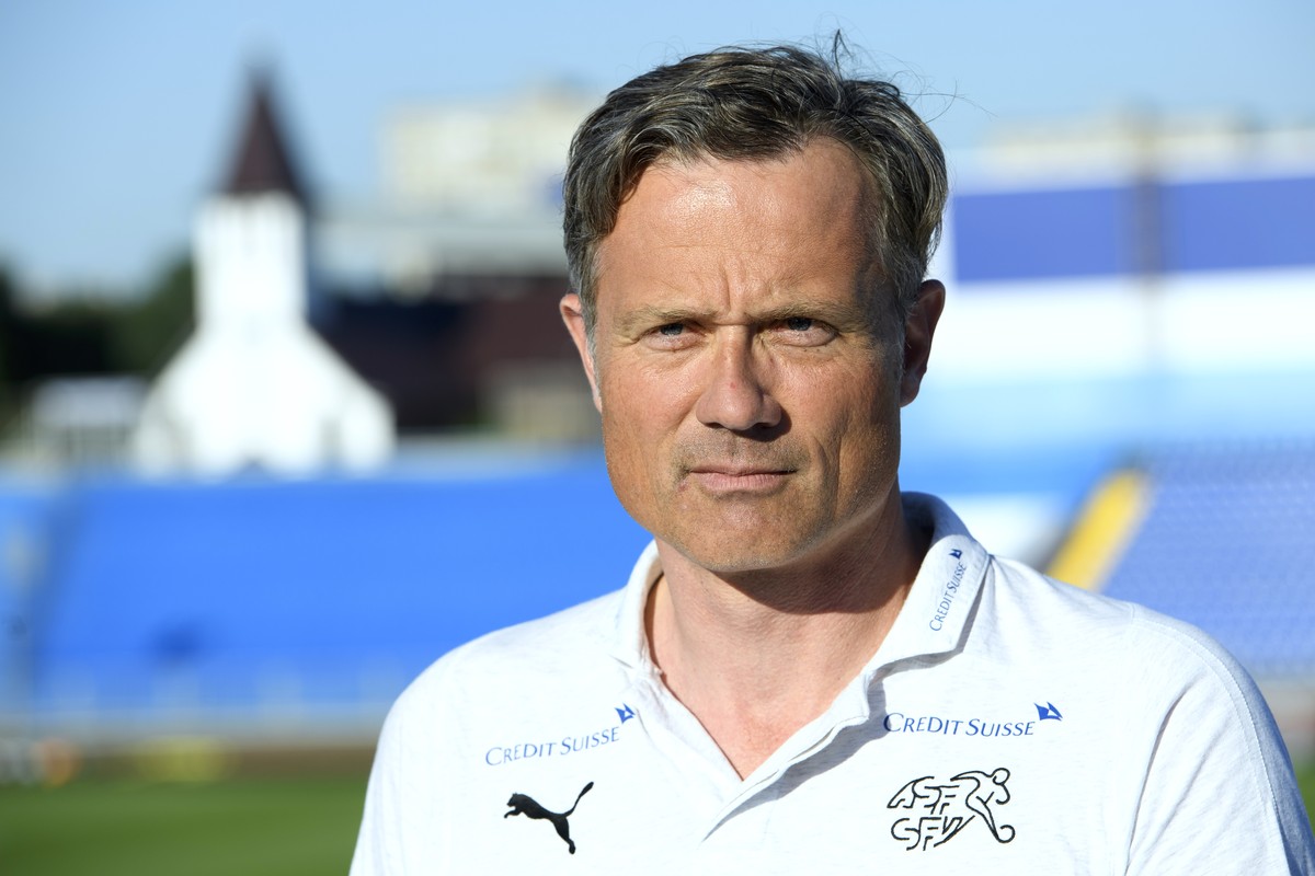 Alex Miescher, General Secretary of the Swiss Footbal Association, SFA, and Head of Mission answers questions from journalists before a training session of the Switzerland's national soccer team  ...