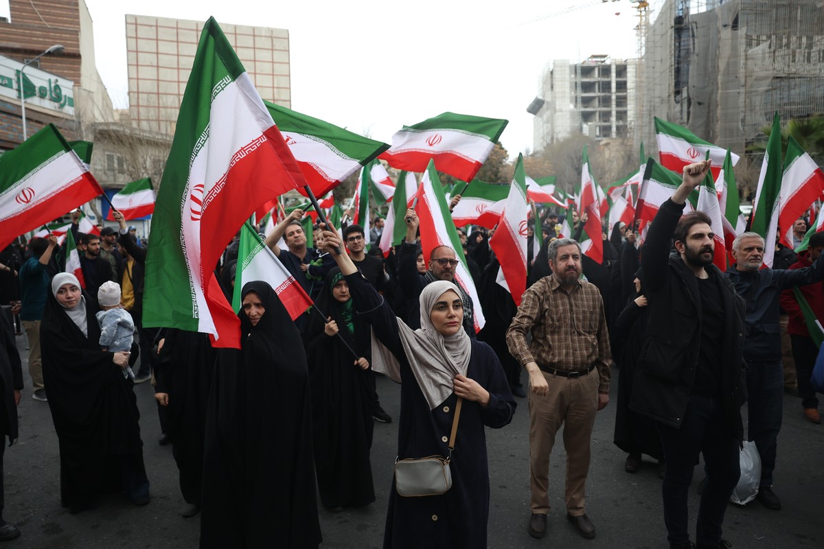 epa12783493 Iranian gather during anti-US and Israeli protests in Tehran, Iran, 28 February 2026. A joint Israeli and US military operation targeted multiple locations across Iran in the early hours o ...