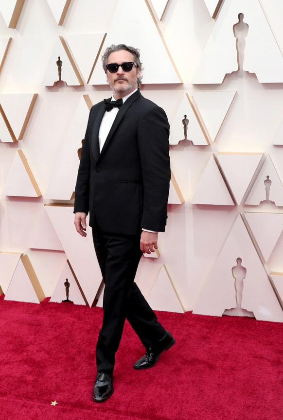 epa08207229 Joaquin Phoenix arrives for the 92nd annual Academy Awards ceremony at the Dolby Theatre in Hollywood, California, USA, 09 February 2020. The Oscars are presented for outstanding individua ...