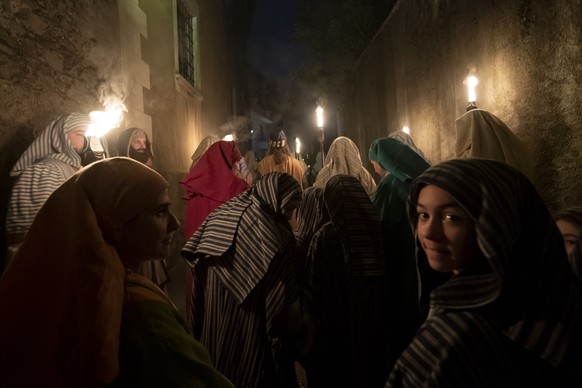 epa07515352 Residents of the Mendrisio region disguised as biblical personalities during the procession of Holy Thursday, representing the Passion of Christ to Golgotha, 18 April 2019, in Mendrisio, S ...