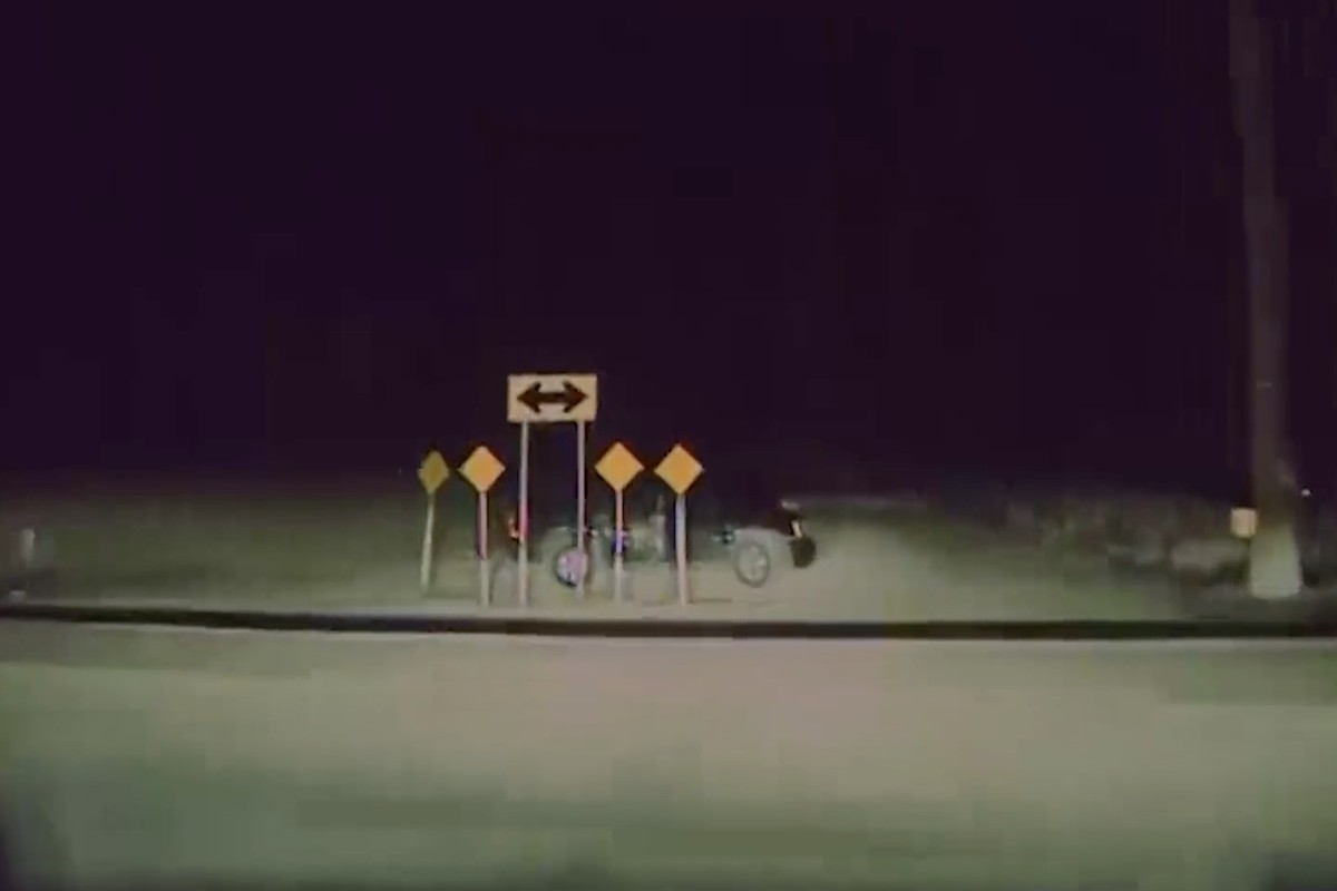 This dashcam video image from a Tesla vehicle driving on Autopilot shows a moment before a fatal crash with the parked vehicle at center, near Key Largo, Fla., on April 25, 2019. The Tesla ran past a  ...