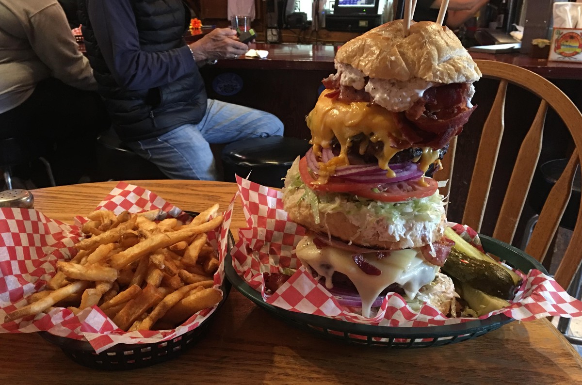 Seward's Folly Burger at the West Rib Pub in Talkeetna, AK
This bad boy touts itself as being the biggest burger in Alaska and considering it weighs in around 5 pounds, we can't disagree. To ...