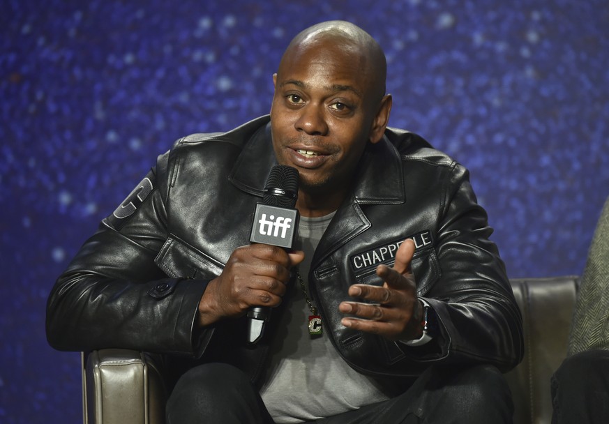 FILE - In this Sept. 8, 2018 file photo, Dave Chappelle speaks at the press conference for &quot;A Star Is Born&quot; on day 4 of the Toronto International Film Festival at the TIFF Bell Lightbox in T ...
