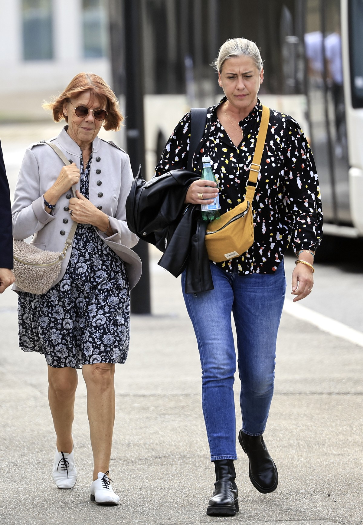 epa11609627 Gisele Pelicot (2-R), her daughter Caroline Darian (R) and her lawyers Stephane Babonneau (2-L) and Antoine Camus (L) walk towards the criminal court during the trial of Gisele Pelicot ...