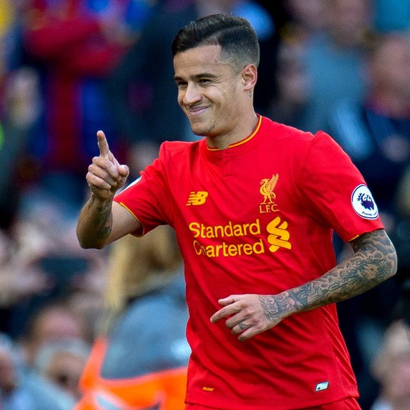 epa05923854 Liverpool’s Philippe Coutinho celebrates scoring the opening goal during the English Premier League soccer match between Liverpool and Crystal Palace at Anfield, Liverpool, Britain, 23 Apr ...