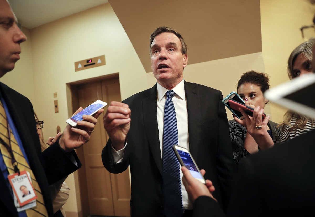 Senate Intelligence Committee Vice Chairman Sen. Mark Warner, D-Va., speaks with reporters on Capitol Hill in Washington, Wednesday, Sept. 27, 2017. President Donald Trump is calling Facebook "an ...