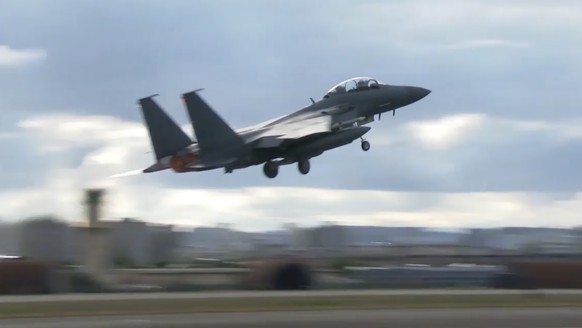 FILE - In this image taken from video, South Korean Air Force&#039;s F15K fighter jet takes off Tuesday, Oct. 4, 2022, in an undisclosed location in South Korea. South Korea says North Korea flew 12 w ...