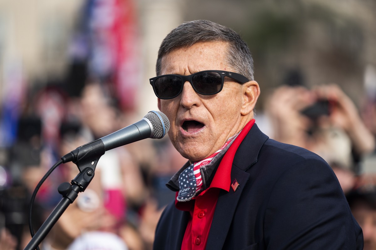epa08879709 Former National Security Advisor and convicted felon Michael Flynn speaks to supporters of US President Donald J. Trump who gathered outside the Supreme Court to echo Trump's baseless ...