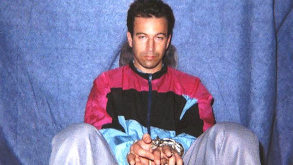 FILE - This file photo obtained on Jan. 30, 2002, shows Wall Street Journal reporter Daniel Pearl in captivity by Pakistani militants. A videotape received by U.S. diplomats in February 2002 confirmed ...