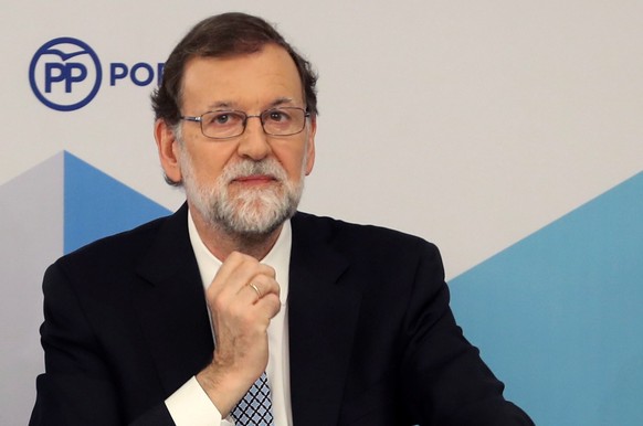 epa06786202 Former Spanish Prime Minister and leader of People&#039;s Party (PP), Mariano Rajoy, reacts as he attends a meeting of PP&#039;s national committee in Madrid, Spain, 05 June 2018. Rajoy ha ...