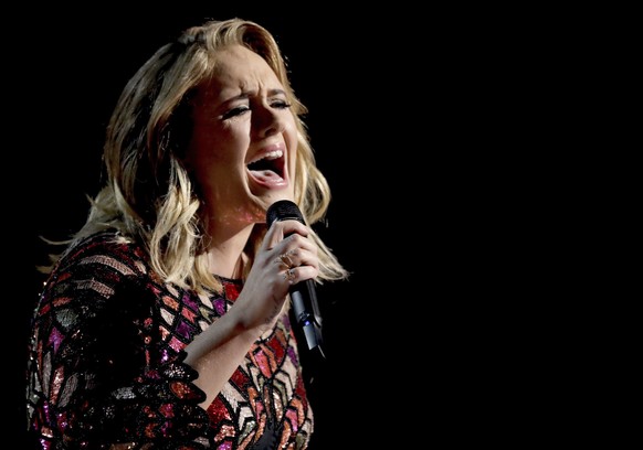 FILE - Adele performs at the 59th annual Grammy Awards in Los Angeles on Feb. 12, 2017. (Photo by Matt Sayles/Invision/AP, File)
Adele