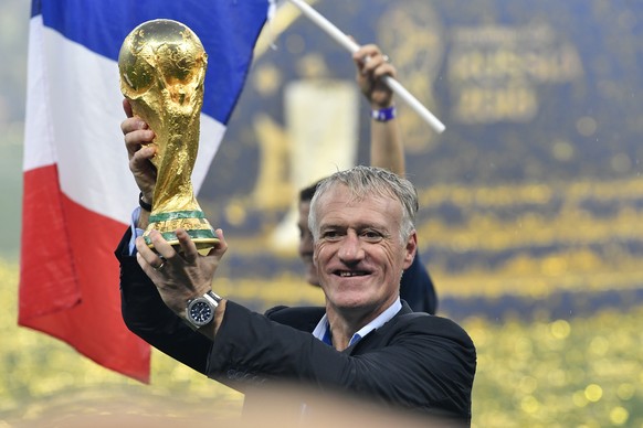 France head coach Didier Deschamps lifts the trophy after France beat Croatia by 4-2 during the final match between France and Croatia at the 2018 soccer World Cup in the Luzhniki Stadium in Moscow, R ...