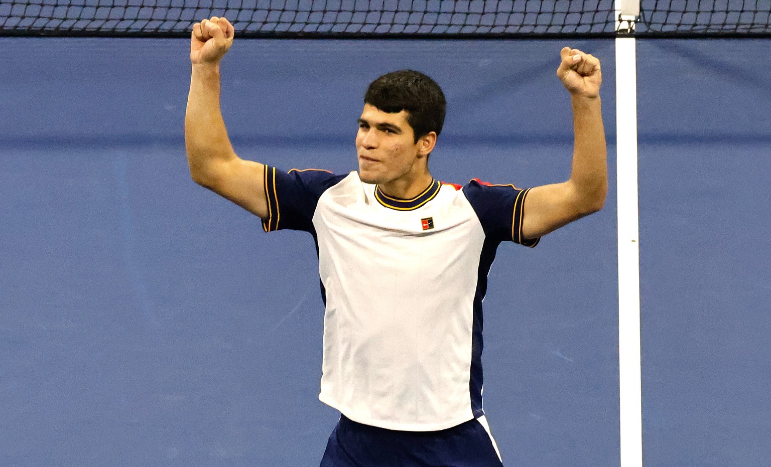 epa09450690 Carlos Alcaraz of Spain reacts after defeating Peter Gojowczyk of Germany at the conclusion of their match on the seventh day of the US Open Tennis Championships at the USTA National Tenni ...