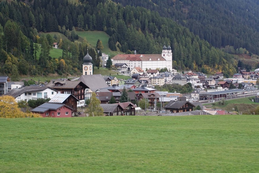 DISENTIS -MUSTER, SWITZERLAND - AUGUST 10: Benedictine monastery in the Swiss Alps, Disentis -Muster, Switzerland on August 10, 2014. The monastery was built between 1696 and 1712.