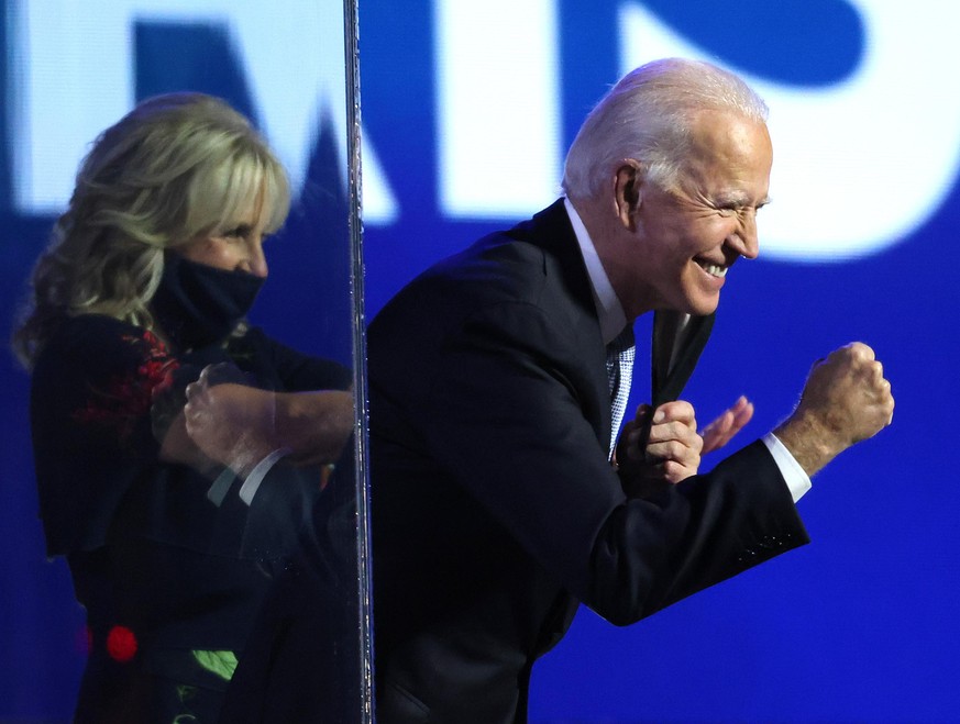 WILMINGTON, DELAWARE - NOVEMBER 07: President-elect Joe Biden greets crowd after his address to the nation from the Chase Center November 07, 2020 in Wilmington, Delaware. After four days of counting ...