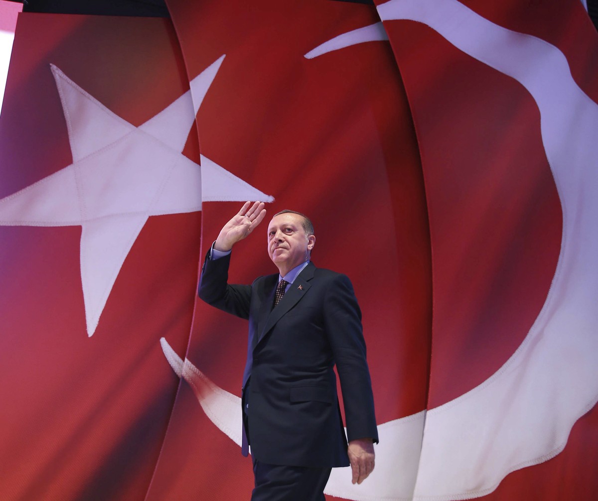 In this late Wednesday, April 12, 2017 photo, Turkey's President Recep Tayyip Erdogan addresses his supporters during a referendum meeting in Istanbul. Turkey is heading to a contentious April 16 ...