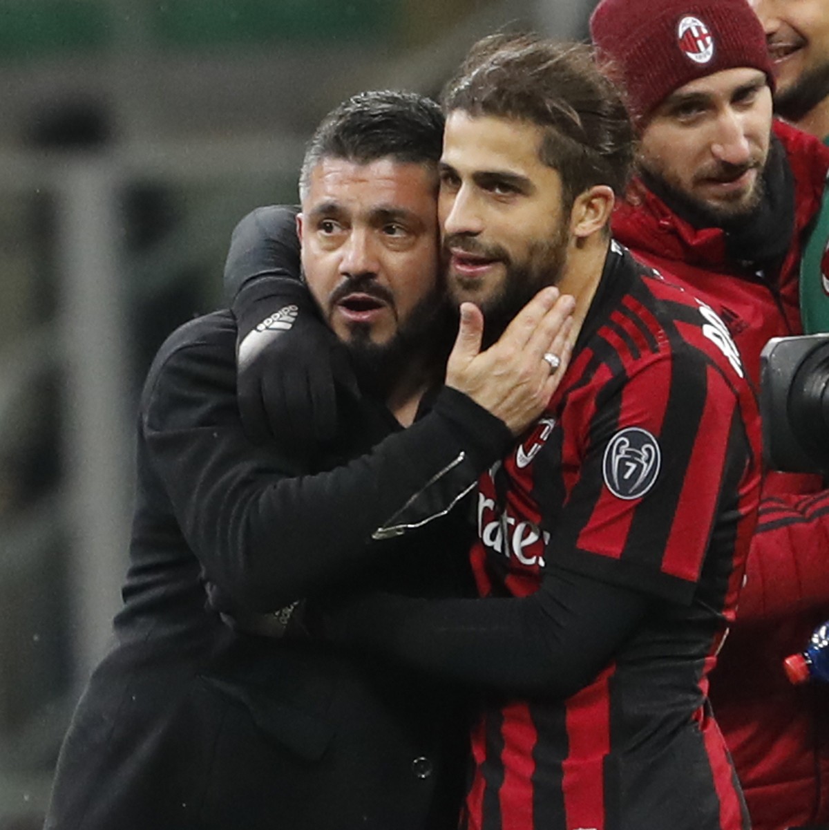 AC Milan coach Gennaro Gattuso embraces AC Milan's Ricardo Rodriguez, who missed a penalty kick, at the end of an Italian Serie A soccer match between AC Milan and Sampdoria, at the San Siro stad ...