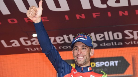Italy&#039;s Vincenzo Nibali celebrates on podium after winning the 16th stage of Giro d&#039;Italia, Tour of Italy cycling race, from Rovetta to Bormio, Tuesday, May 23, 2017. (Alessandro Di Meo/ANSA ...