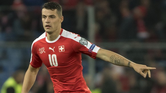 Switzerland&#039;s Granit Xhaka in action during the 2018 Fifa World Cup Russia group B qualification soccer match between Switzerland and Hungary in the St. Jakob-Park stadium in Basel, Switzerland,  ...