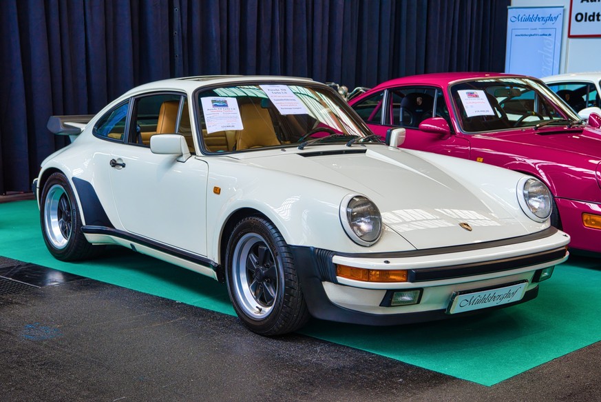 FRIEDRICHSHAFEN - MAY 2019: white PORSCHE 911 930 964 TURBO 1987 cabrio at Motorworld Classics Bodensee on May 11, 2019 in Friedrichshafen, Germany. xkwx 911, 930, 964, Classic, porsche 911, Porsche,  ...
