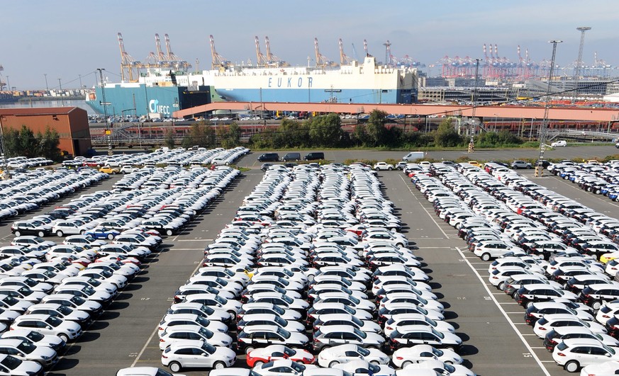 epa04960435 New cars from Audi and Mercedes Benz in the car terminal in Bremerhaven, Germany, 02 October 2015. Near to these German cars from other marks BMW and Daimler, other cars from the Volkswage ...