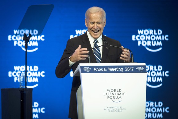 epa05726975 US vice president Joe Biden addresses a plenary session at the 47th Annual Meeting of the World Economic Forum (WEF) in Davos, Switzerland, 18 January 2017. The annual meeting brings toget ...