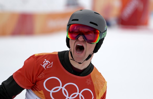 epa06559330 Nevin Galmarini of Switzerland reacts after his run during the men&#039;s Snowboard Parallel Giant Slalom competition at the Bokwang Phoenix Park during the PyeongChang 2018 Olympic Games, ...