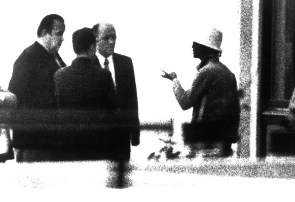 Picture dated September 5, 1972 of then German Interior Minister Hans-Dietrich Genscher (L) with other unidentified German officials listening to the demands of an unidentified Palestinian kidnapper ( ...