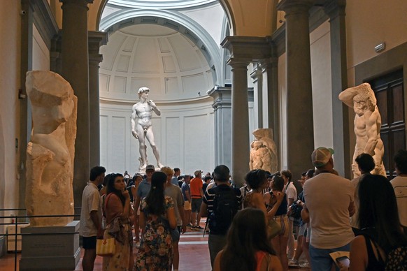 July 29, 2024, New York, New York, USA: Travel and vacations have become all about taking cellphone photos to share on social media and checking off certain destinations that have become crowded due t ...