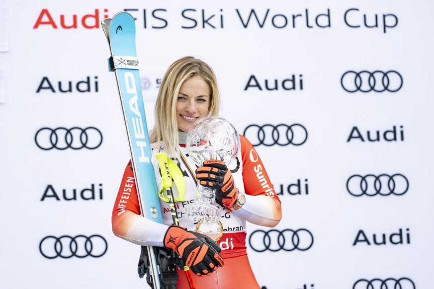 Lara Gut-Behrami of Switzerland celebrates with the women's Super-G discipline leader crystal globe trophy during the podium ceremony of the women's Super-G discipline at the FIS Alpine Ski  ...