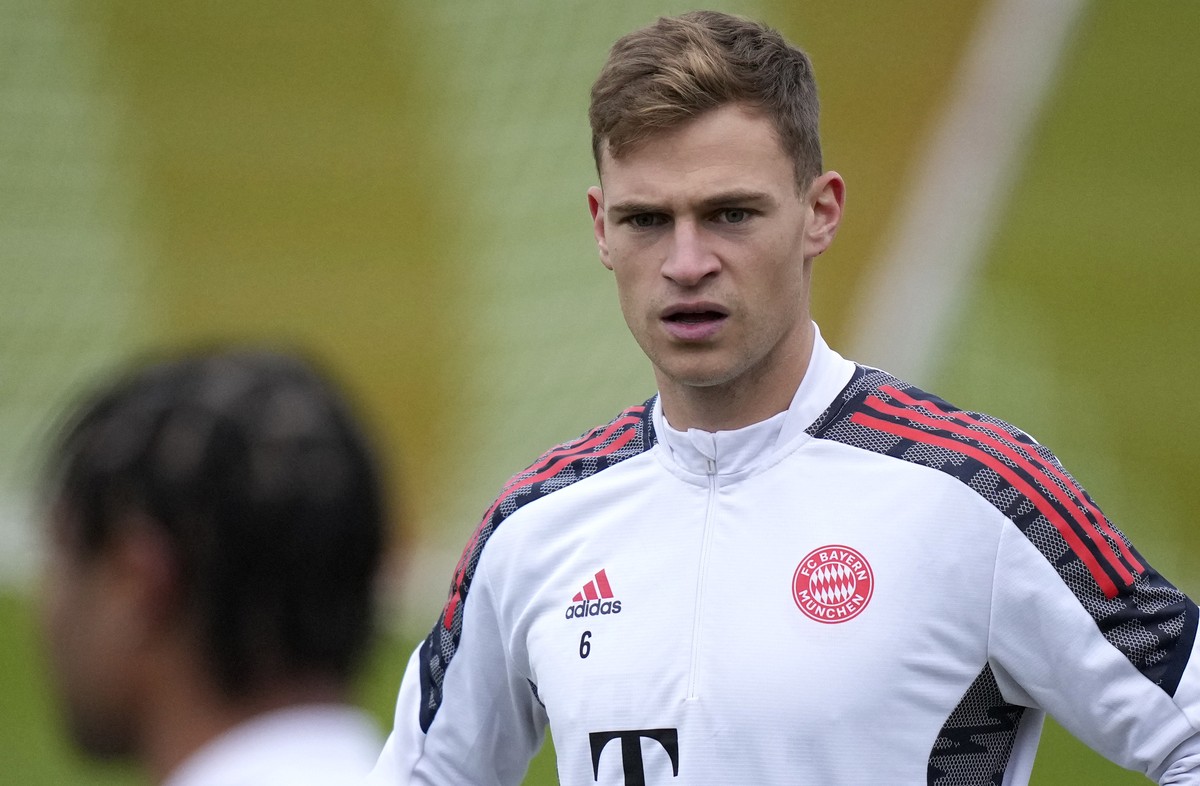 FILE - Bayern's unvaccinated Joshua Kimmich watches team mate Serge Gnabry during a training session in Munich, Germany, Monday, Nov. 1, 2021. Canceled games, players in quarantine, arguments ove ...