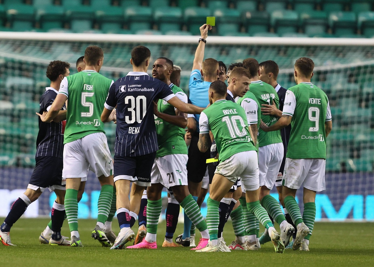 Hibernian v FC Luzern UEFA Europa Conference League Kemal Ademi of FC Luzern middle receives a yellow card as players clash during the UEFA Europa Conference League Third Qualifying Round First Leg ma ...