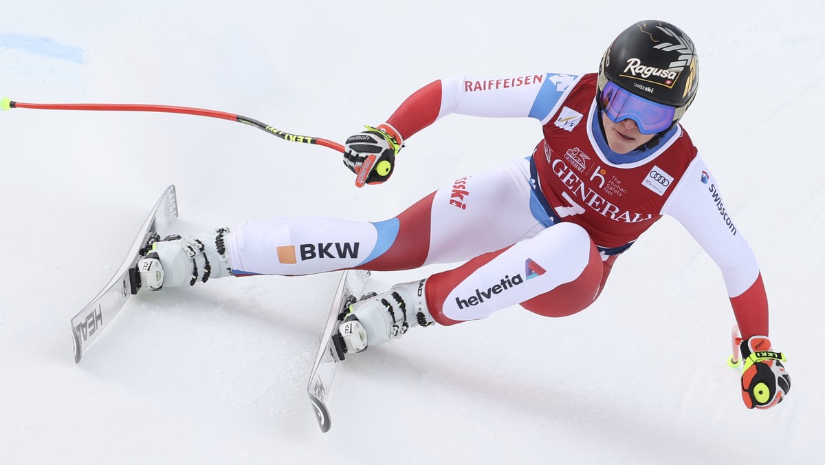 Switzerland's Lara Gut-Behrami speeds down the slope during an alpine ski, women's World Cup downhill, in Val di Fassa, Italy, Saturday, Feb. 27, 2021. (AP Photo/Alessandro Trovati)