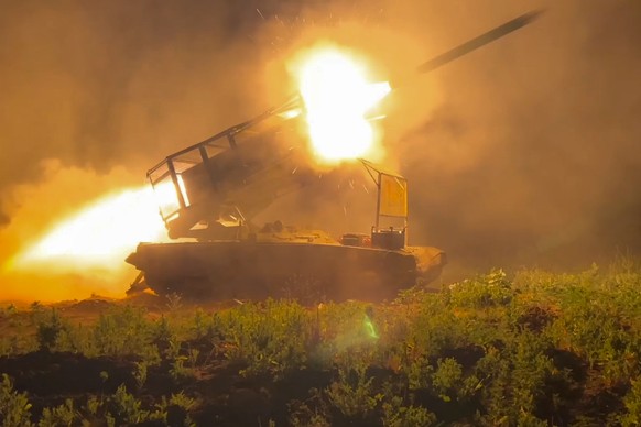 In this photo taken from a video released by Russian Defense Ministry press service on Wednesday, Nov. 13, 2024, the Russian army&#039;s multiple rocket launcher Solntsepyok fires towards Ukrainian po ...