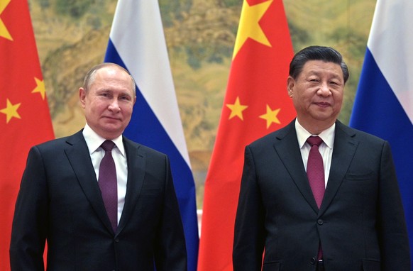 Chinese President Xi Jinping, right, and Russian President Vladimir Putin pose for a photo prior to their talks in Beijing, China, Friday, Feb. 4, 2022. Putin on Friday arrived in Beijing for the open ...