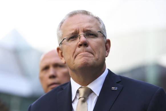 epa08048146 Australian Prime Minister Scott Morrison speaks to the media during an announcement to increase counter-terrorism measures at Canberra Airport, in Canberra, Australia, 06 December 2019. Mo ...