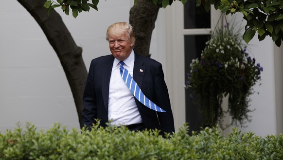 President Donald Trump arrives n the Kennedy Garden of the White House in Washington, Monday, May 1, 2017, to speak to the Independent Community Bankers Association. (AP Photo/Evan Vucci)